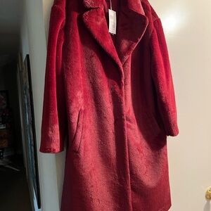 Elegant faux burgundy Women's Coat.. bought at Nordstrom. Fits like medium